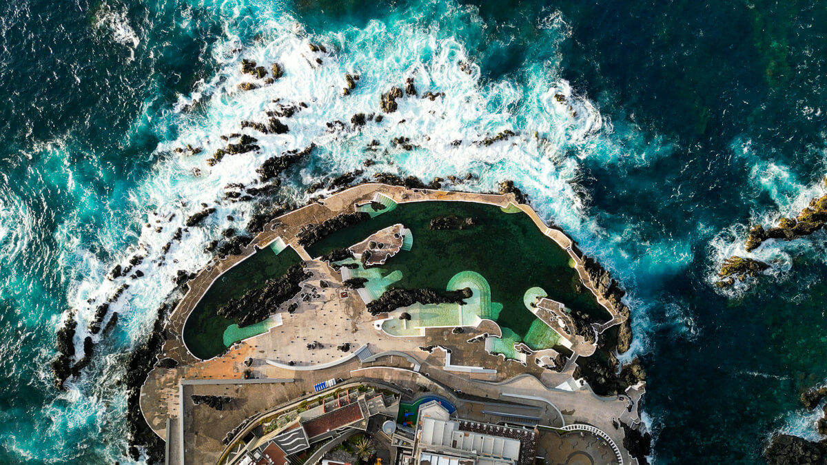 Porto Moniz lava pools drone shot perspective