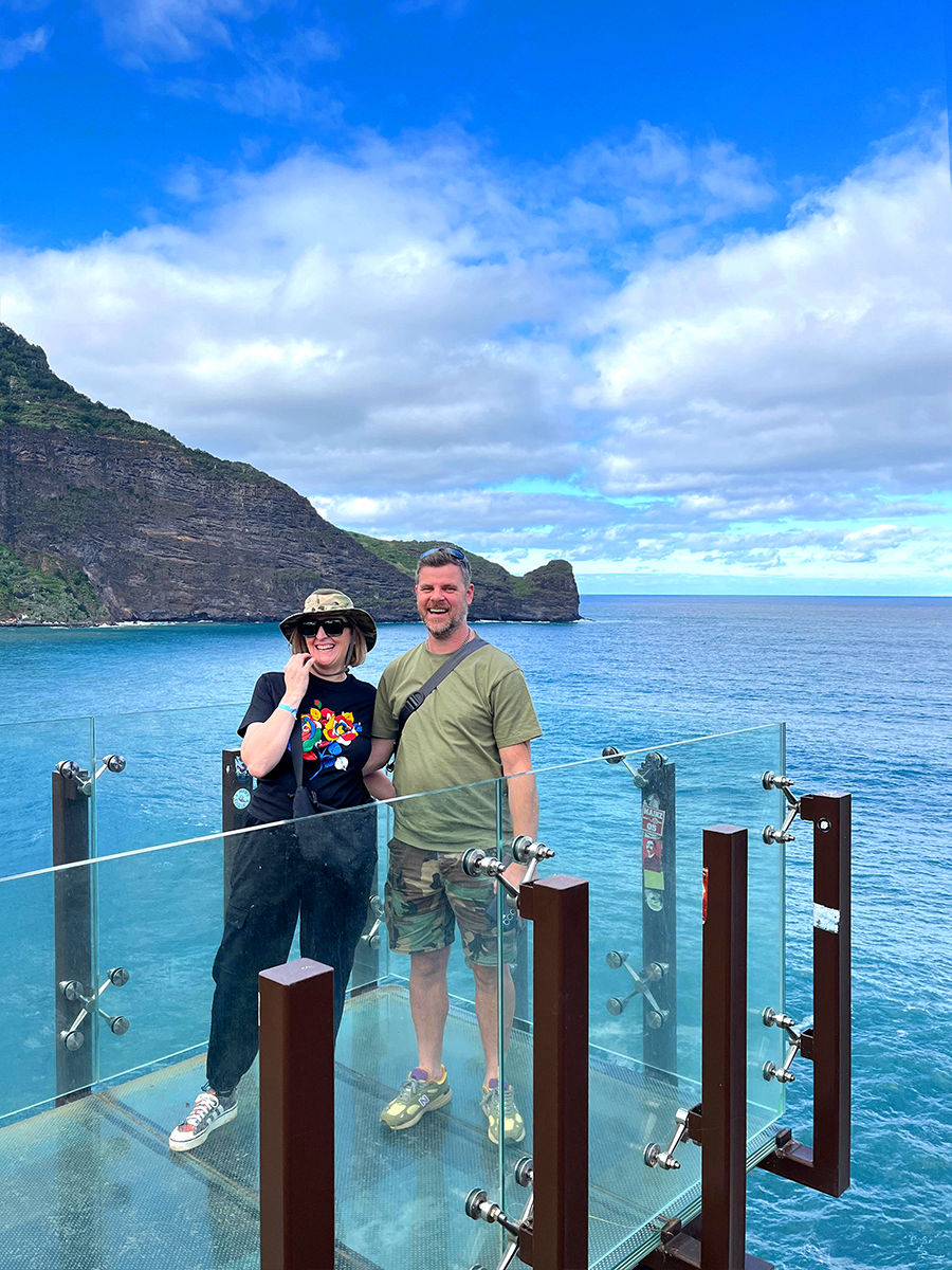 Coast view with small villages and ocean, blue sky in the midday sun
